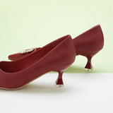 Passionate Red Accents: Embellished Red Kitten Heel Pumps with a stylish buckle, perfect for making a confident and stylish statement