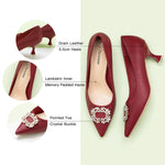 Bold and Beautiful: Red Embellished Buckle Kitten Heel Pumps, a statement piece for adding a pop of color and allure to your ensemble.