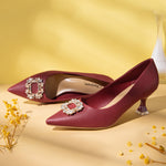 Bold and Beautiful: Red Embellished Buckle Kitten Heel Pumps, a statement piece for adding a pop of color and allure to your ensemble.