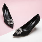  Black Glitter Tweed Pumps with an embellished square buckle, adding a touch of glamour to your step.