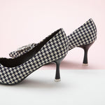 Houndstooth Tweed Pumps with unique square buckle details, perfect for professional settings.
