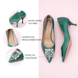 Elegant green pumps with sparkling crystal embellishments and a stylish buckle – a refreshing and stylish choice for adding a pop of color to your ensemble.