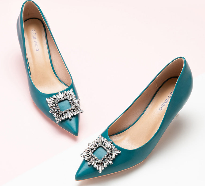 Elegant peacock blue high heels featuring a crystal-encrusted buckle
