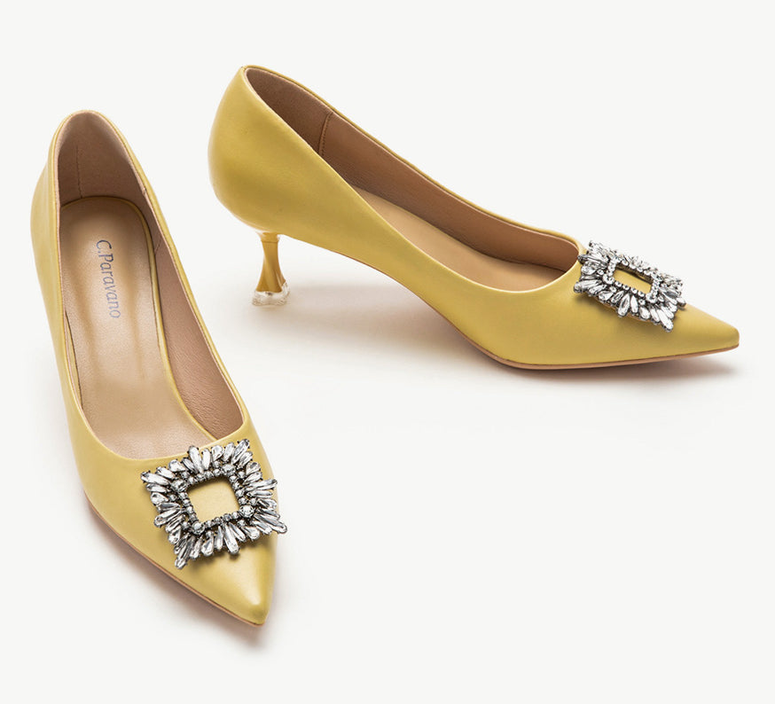 Yellow leather pumps with a stunning crystal buckle embellishment
