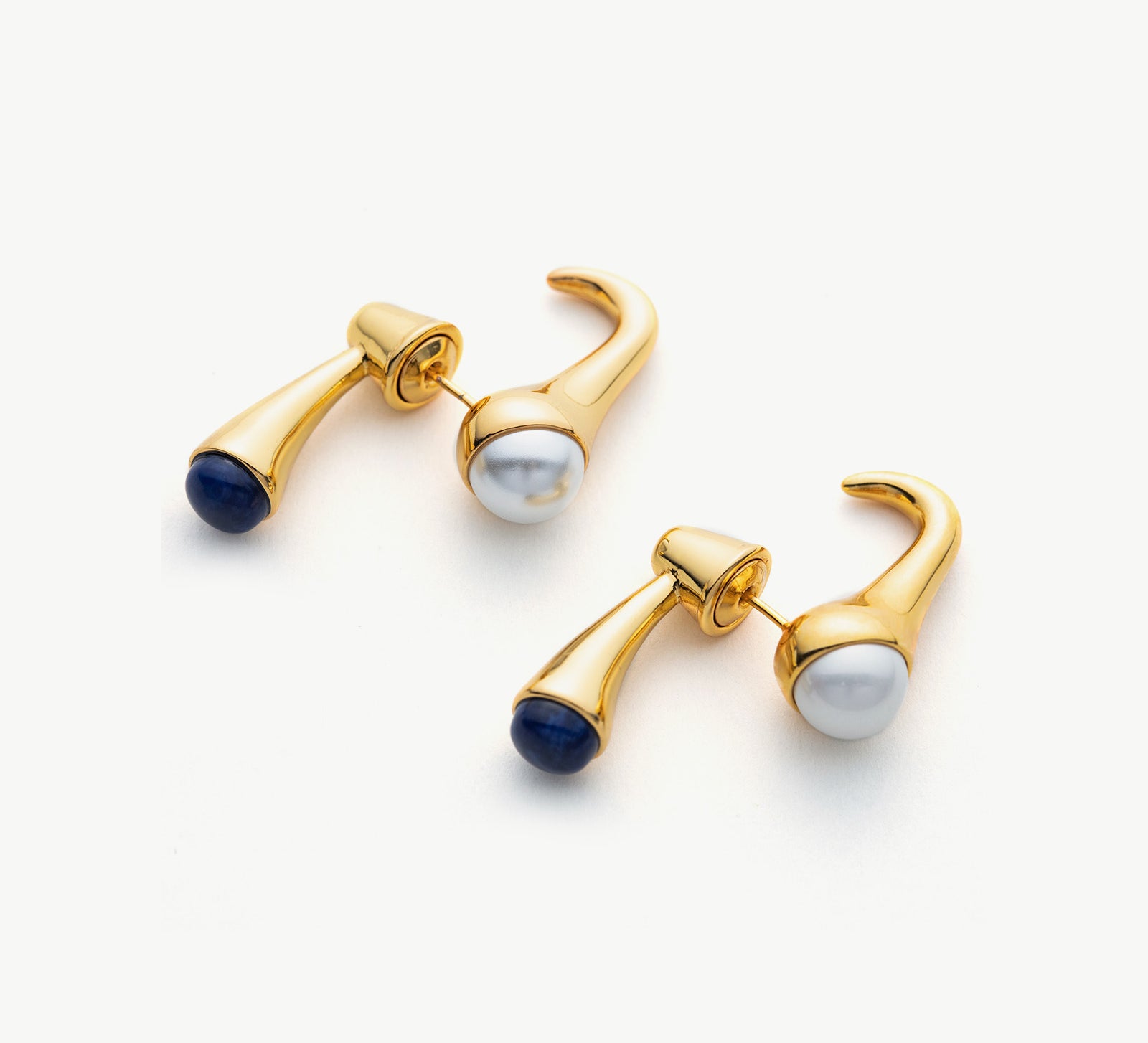 Pearl Crossover Hoop Earrings, a chic and stylish choice that showcases an embrace of pearls in a trendy crossover pattern for a fashionable look