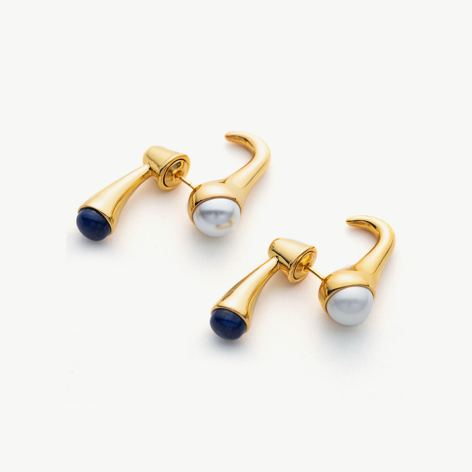 Pearl Crossover Hoop Earrings, a chic and stylish choice that showcases an embrace of pearls in a trendy crossover pattern for a fashionable look