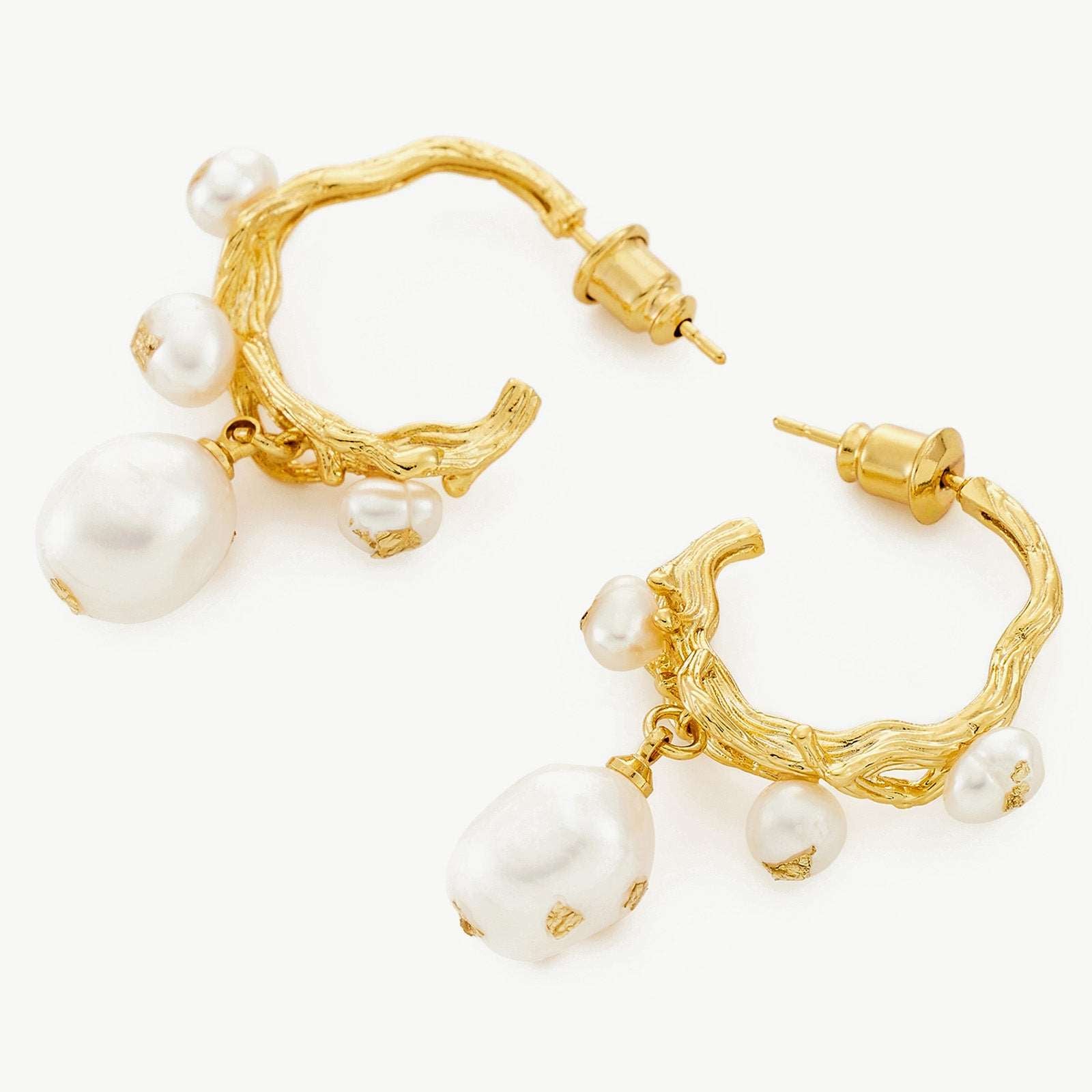 Baroque Pearl Drop Earrings, sculpted to perfection, these earrings highlight the unique and organic shapes of baroque pearls for a distinctive and artistic look.