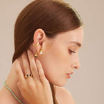Baroque Pearl Ear Cuff in silver, a lustrous and stylish piece that enhances your look with a cool and radiant shine.