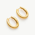 Gold Tunnel Hoop Earrings creating an eternal circlet of gold, these hoops offer a classic and versatile accessory that complements any outfit with grace