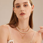 Gold Tunnel Hoop Earrings, capturing the sunlit glow, these hoops bring a warm and radiant charm to your ears, making a statement of sophisticated style