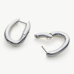 Tunnel Hoop Earrings in Chic Silver, featuring chic loops of silver, these earrings enhance your style with a modern and fashionable flair, perfect for any occasion
