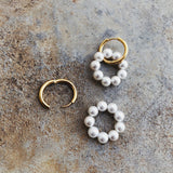 Hoop Earrings with Seed Pearls, a timeless and versatile choice that effortlessly complements both casual and formal ensembles