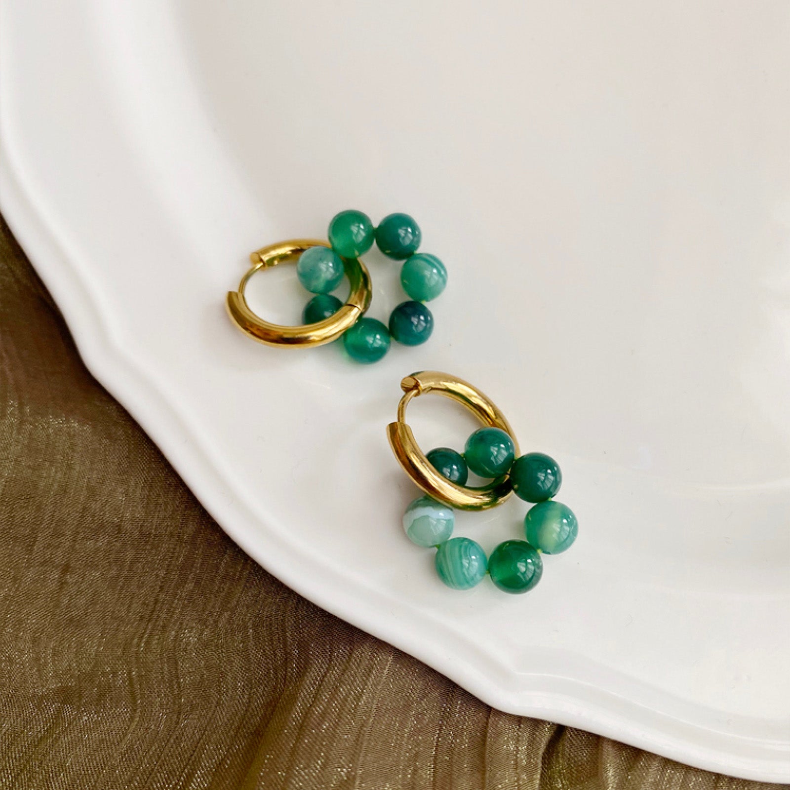 Medium Hoop Earrings with Agate Accents, creating a whirlwind of style with agate stones, these medium-sized hoops make a bold and fashionable statement