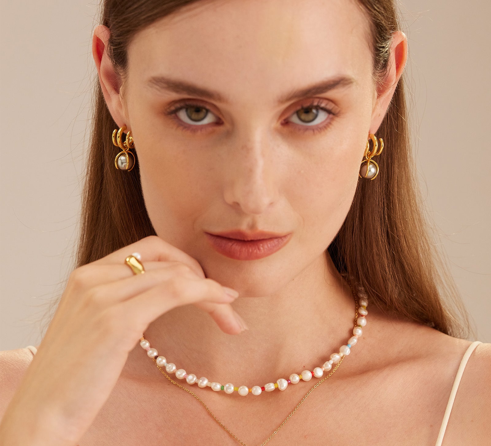  Fine Pearl Earrings featuring classic pearl adornments, these earrings offer a versatile and stylish accessory that complements any outfit with grace