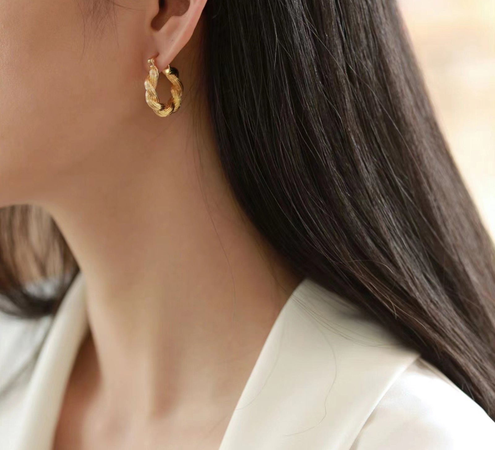 Double Rope Hoop Earrings, featuring sophisticated loops of rope, these hoops provide a refined and timeless addition to your ear jewelry collection