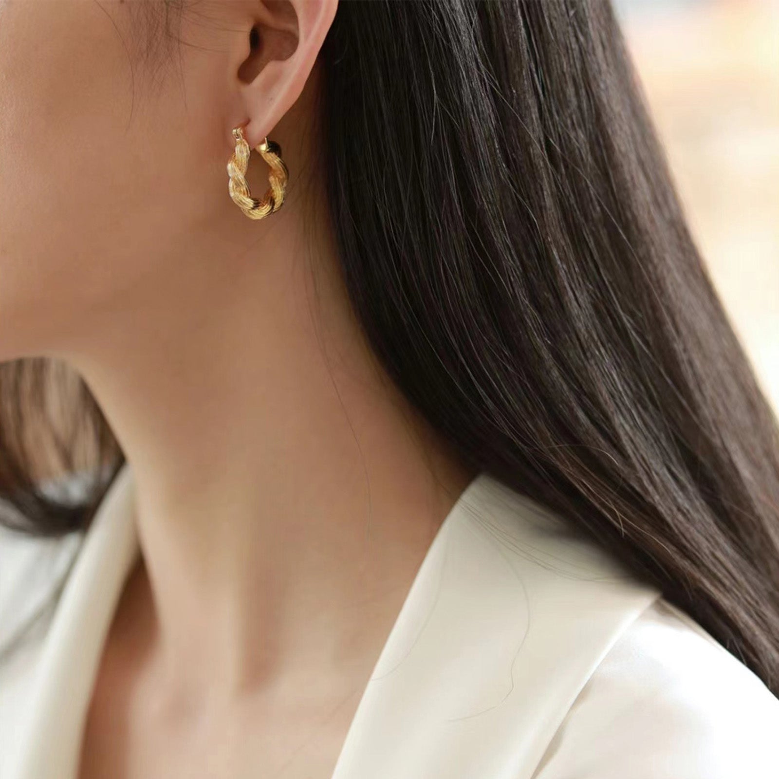 Double Rope Hoop Earrings, featuring sophisticated loops of rope, these hoops provide a refined and timeless addition to your ear jewelry collection