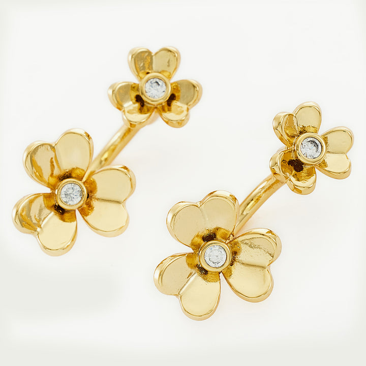 Double Flowers Charm Hoop Earrings, whimsically designed with dual flower charms, creating a playful and enchanting accessory.