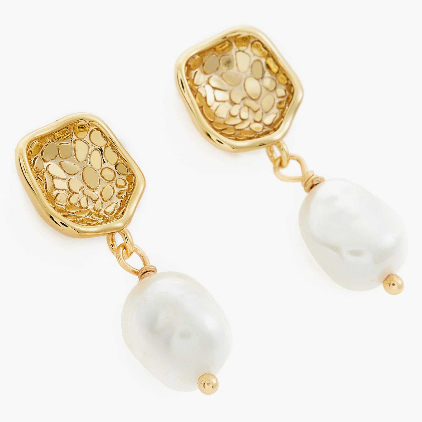 Molten Baroque Pearl Drop Earrings, adorned with gilded molten metal accents, these earrings exude grace and luxury, adding a touch of opulence to your ear ensemble