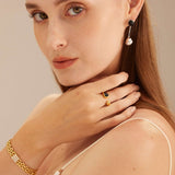  Silver Agate and Pearl Charm Earrings with chic silver accents, these earrings bring a modern and trendy flair to your style, making them a fashionable and eye-catching accessory.