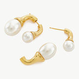 Double Pearls Earrings in a dazzling gold setting, radiating warmth and brilliance for an effortlessly glamorous appearance