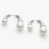 Double Pearls Earrings in Silver, capturing the essence of moonlit beauty with the lustrous pearls and silver accents