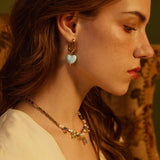 Heart Hoop Earrings in shades of blue ceramics, exuding elegance and sophistication with their heart-shaped design and calming blue tones.
