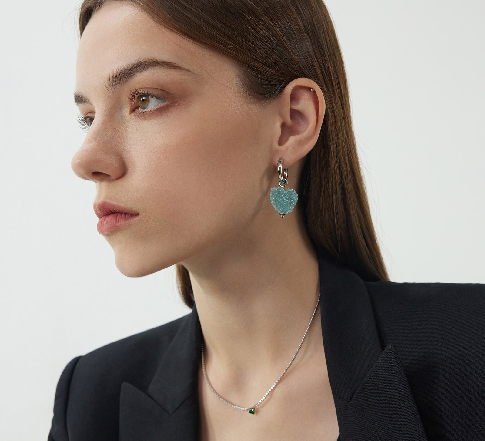 Heart Hoop Earrings in Blue Horizon, radiating with a horizon-inspired glow, these hoops add a touch of serenity with heart shapes in a calming blue hue