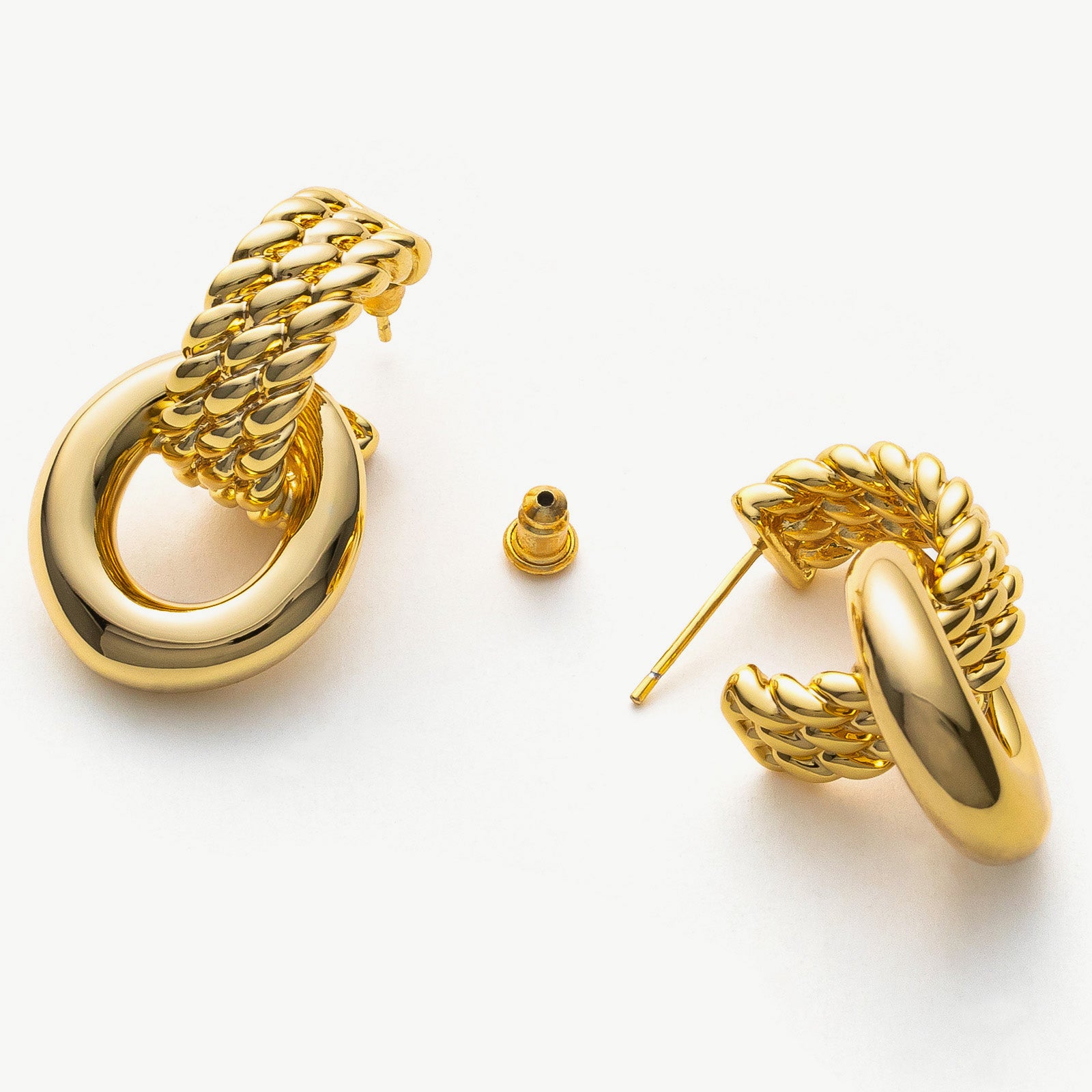 Ring Entwine Chunky Earrings featuring radiant gold circlets, these hoops offer a dynamic and eye-catching accessory, perfect for a bold and stylish appearance.