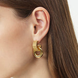 Ring Entwine Chunky Earrings with sculpted gold details, these earrings provide a unique and artistic charm, capturing attention with their intricate design