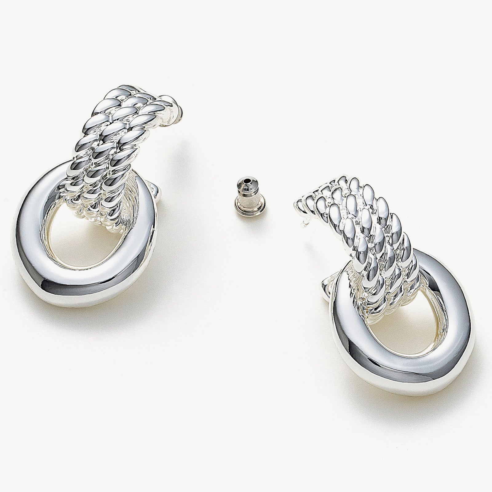 Ring Entwine Chunky Earrings, showcasing a modern twist with silver entwined rings, these earrings bring a touch of contemporary style to your overall look