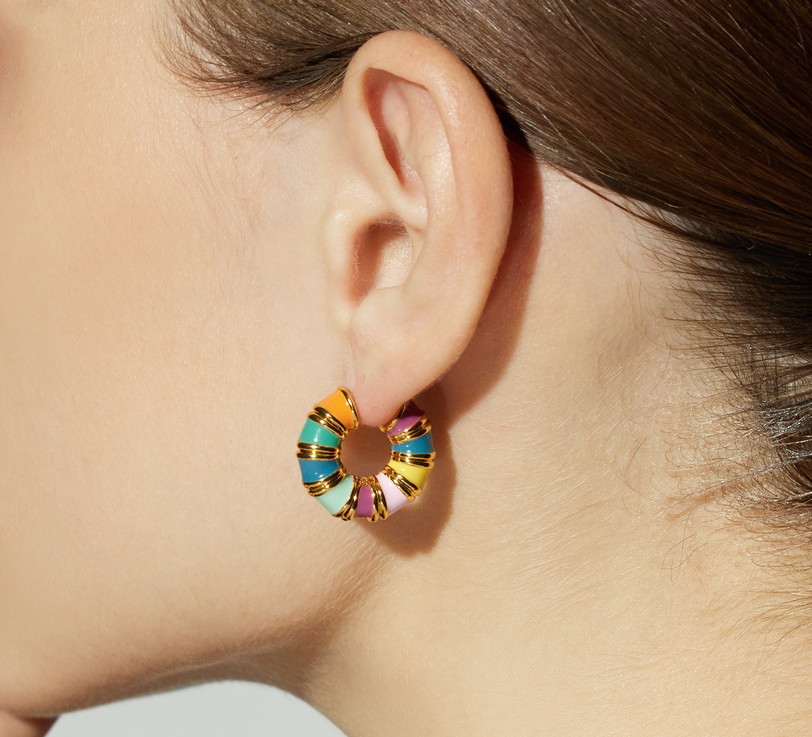 Hoop Earrings with a burst of multicolor hues, making a bold and bright statement that adds a touch of excitement to your style