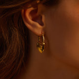 Hoop Earrings adorned with golden hearts and crystals, exuding gilded elegance and timeless charm for a luxurious and stylish appearance