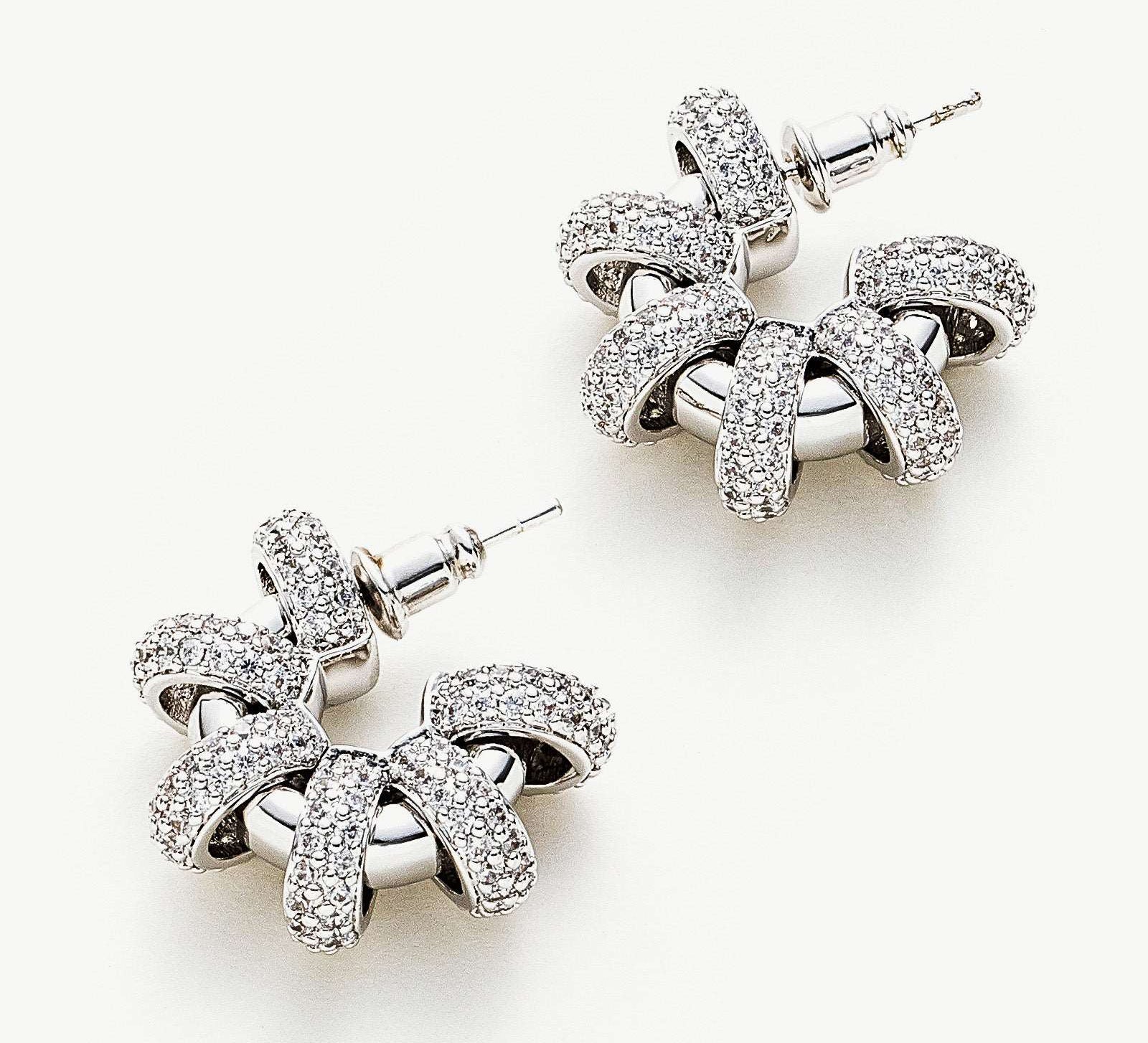 Coiled Single Earrings making an artistic statement with their coiled design, these earrings capture attention and bring a contemporary flair to your style.