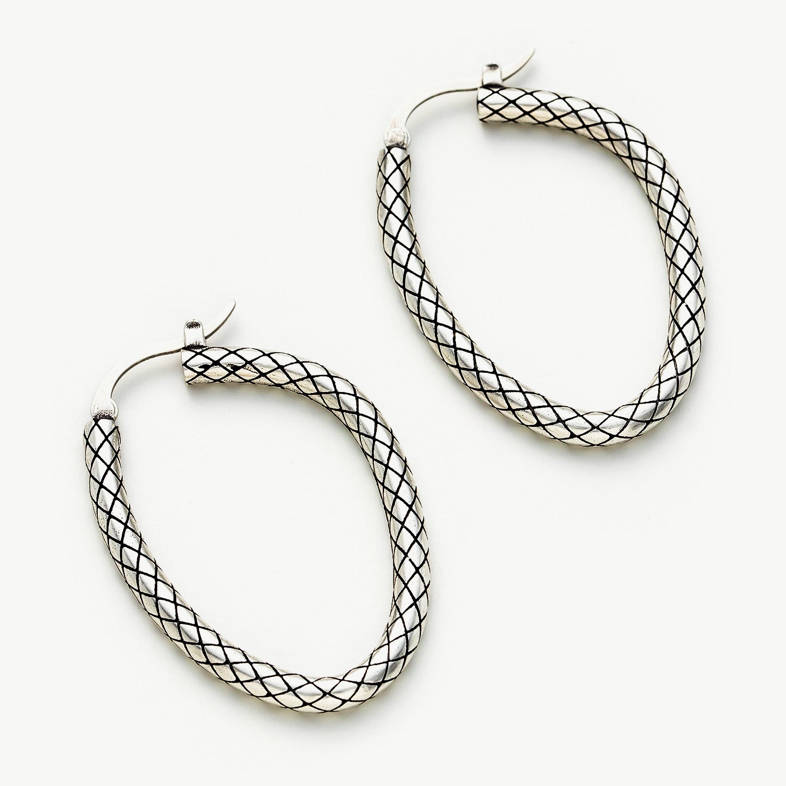 Hoop Earrings meant to face forward, offering a contemporary and charming appeal that effortlessly enhances your everyday or evening look.