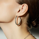 Hoop Earrings with a front-facing flair, a bold and unique style statement that captures attention with its distinctive and eye-catching design
