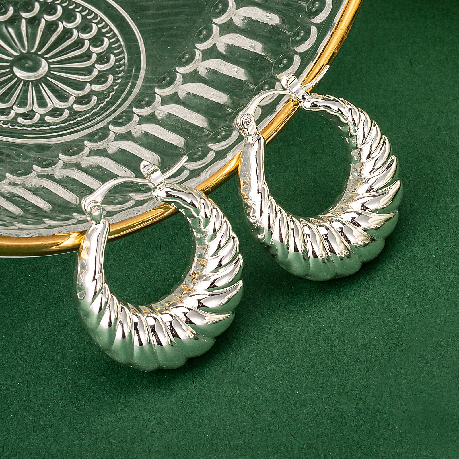 Dome Ridge Hoop Earrings with a chic appeal, these hoops bring a touch of trendiness to your style, making them a fashionable and eye-catching choice