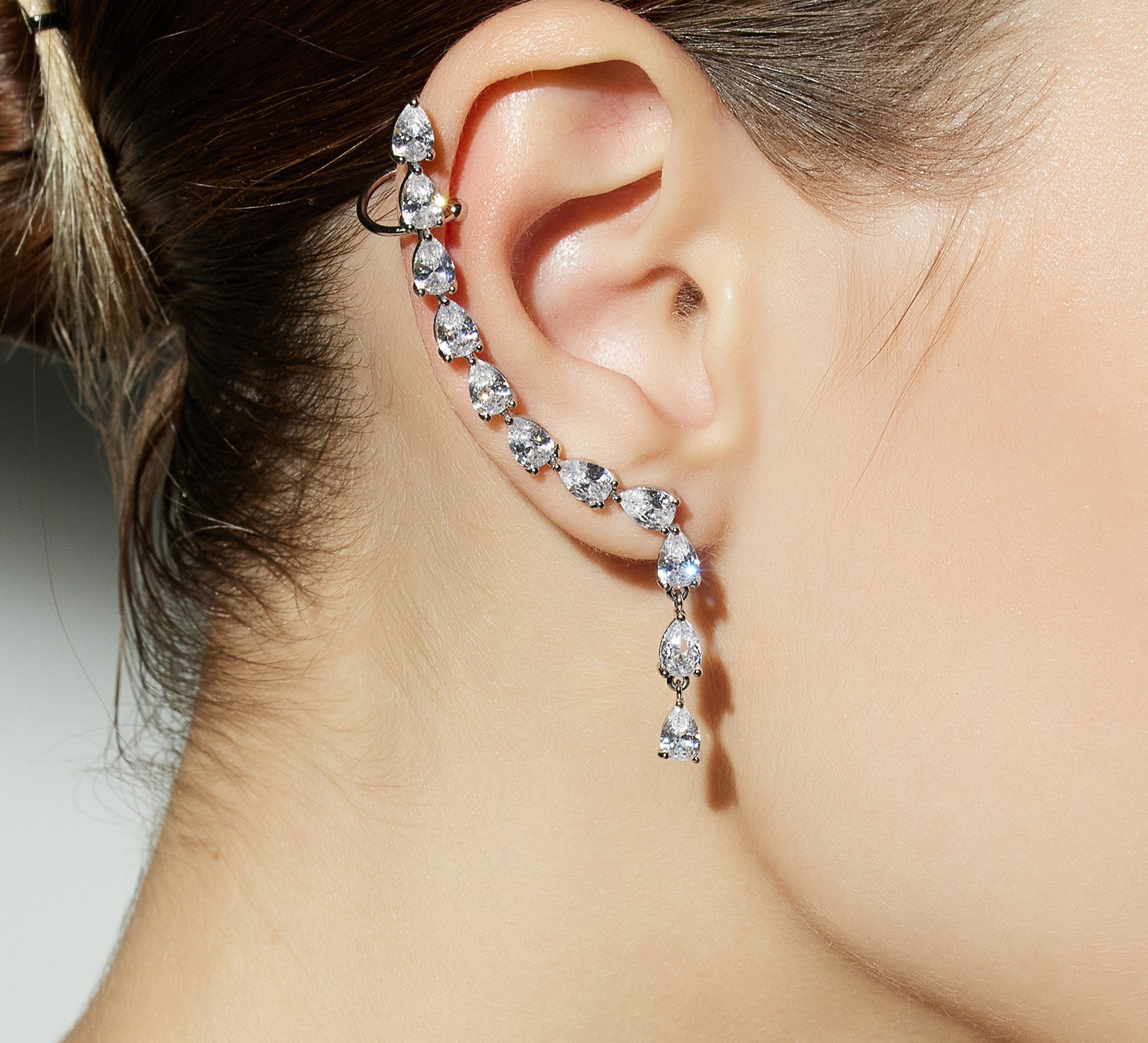 Water Drop Ear Climbers, designed for an elegant ascent along your ear, these climbers emulate the beauty of water droplets, adding a touch of sophistication to your ensemble.