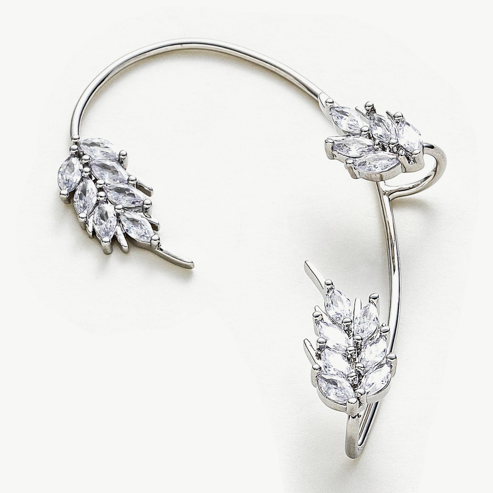 Feather Ear Climbers, a versatile and stylish accessory that adds a touch of sophistication to any outfit