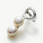  Pearl Ear Cuff in silver, a versatile and understated accessory that effortlessly complements your ensemble