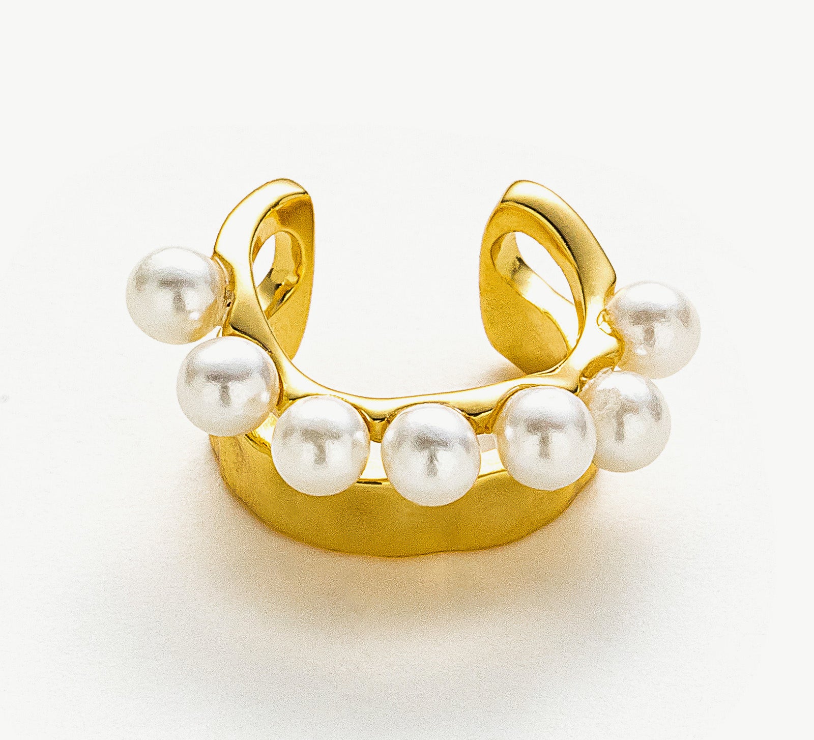 Pearl Ear Cuff in gold, a gleaming and stylish piece that enhances your look with a warm and luminous glow