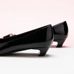 Elegant black closed toe heels for formal occasions