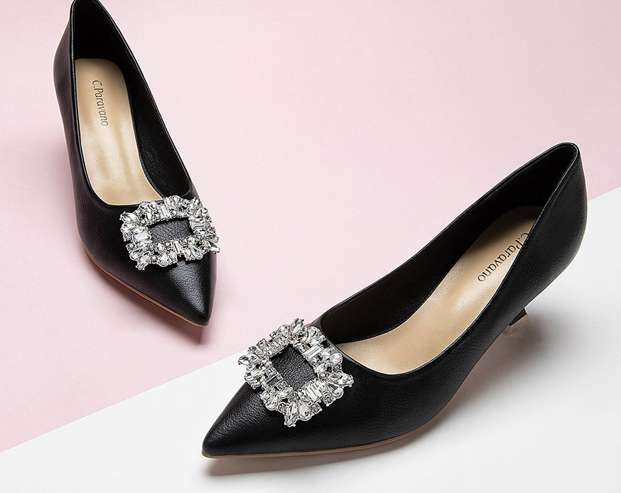 Elegant-black-leather-pumps-with-embellishments_-adding-a-touch-of-glamour-and-refinement-to-your-outfit