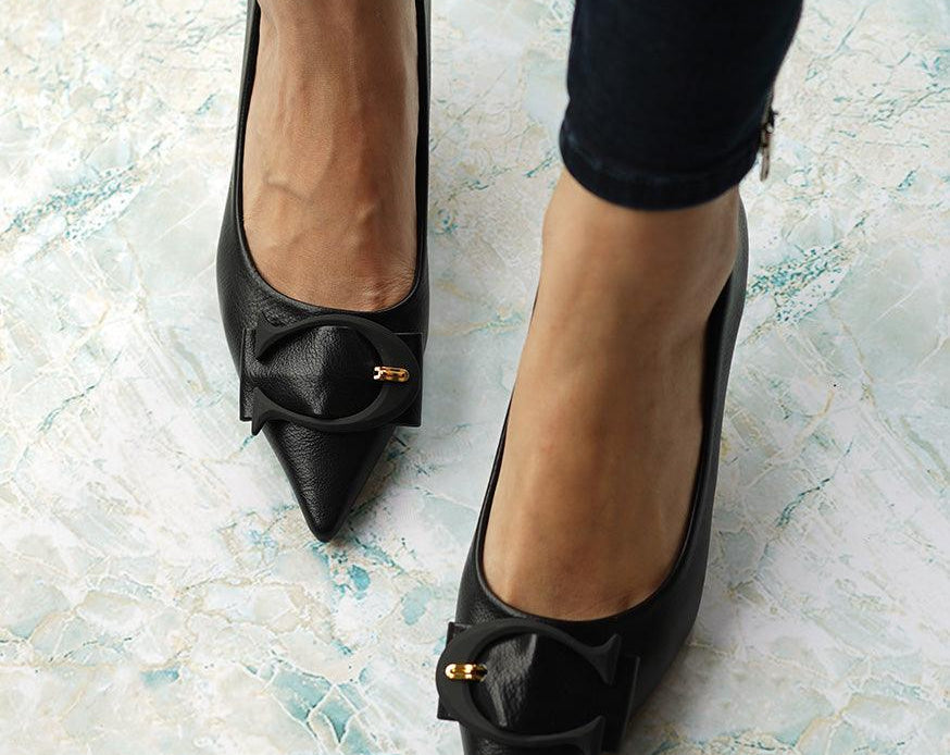 Elegant-black-pumps-with-C-shaped-buckle-detailing_-adding-a-touch-of-sophistication-and-style-