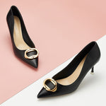 Elegant-black-pumps-with-pointed-toes-and-buckle-detailing_-adding-a-touch-of-refinement-and-style