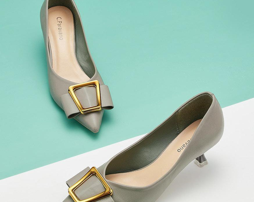 Elegant-green-pumps-with-buckle-detailing_-adding-a-touch-of-sophistication-and-style