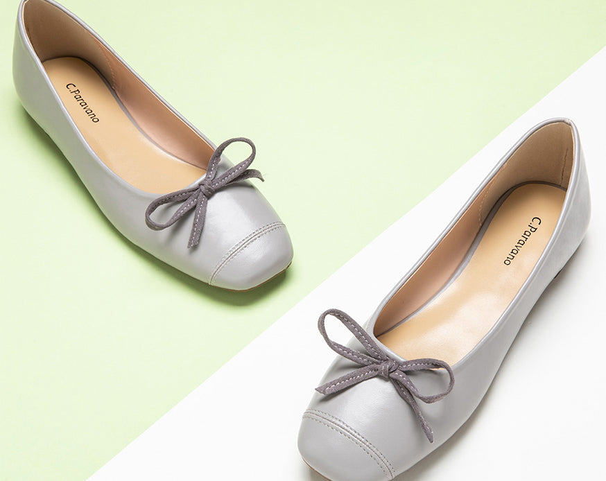 Elegant-grey-bowknot-ballet-flats-featuring-a-suede-toe_-adding-a-touch-of-refinement.