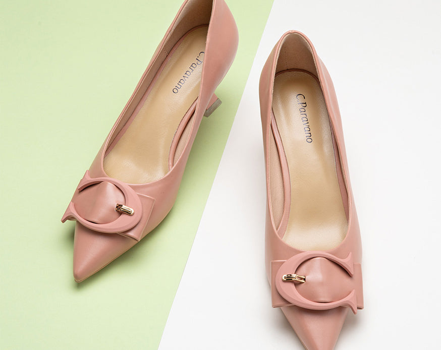 Elegant-pink-pumps-with-C-shaped-buckle-detailing_-adding-a-touch-of-sophistication-and-style