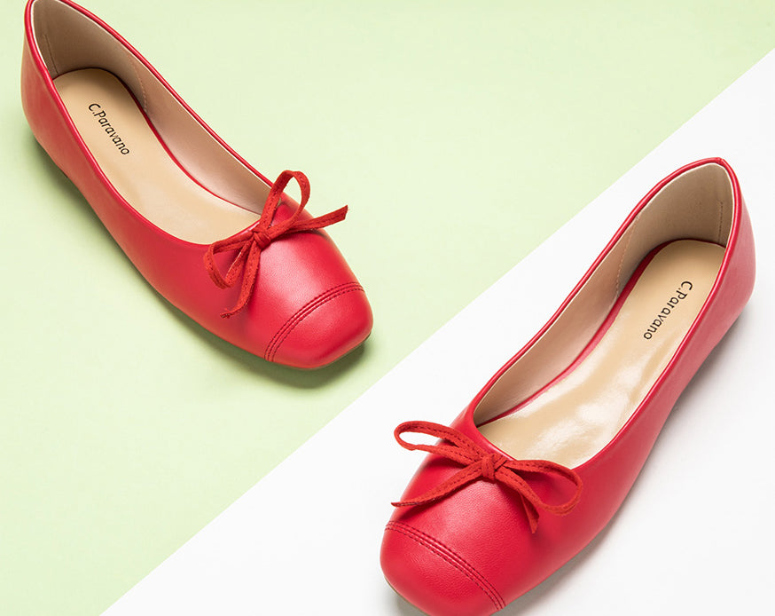 Elegant-red-bowknot-ballet-flats-featuring-a-suede-toe_-adding-a-touch-of-sophistication.