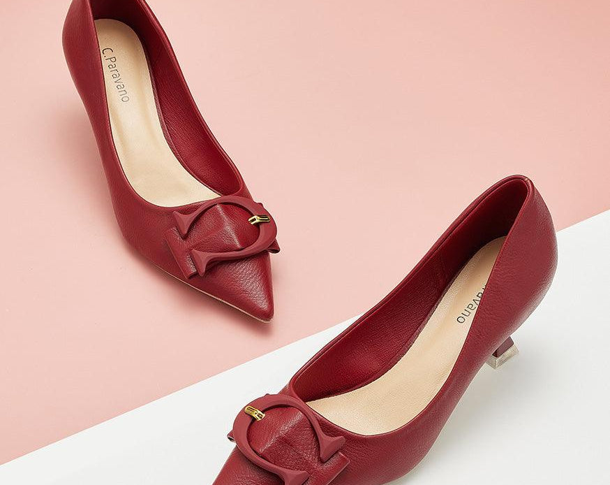 Elegant-red-pumps-with-C-shaped-buckle-detailing_-adding-a-touch-of-sophistication-and-style