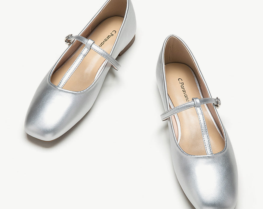Elegant-silver-mary-jane-with-a-crossed-stripe-offering-a-touch-of-glamour-to-any-ensemble